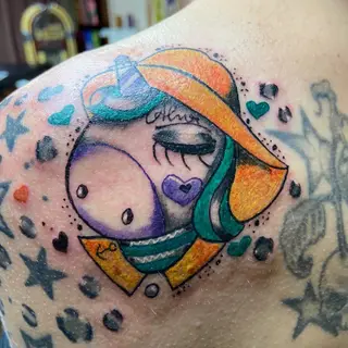 Tattoo von Tschiggy mit einem Einhorn im Bubblegum-Art-Stil