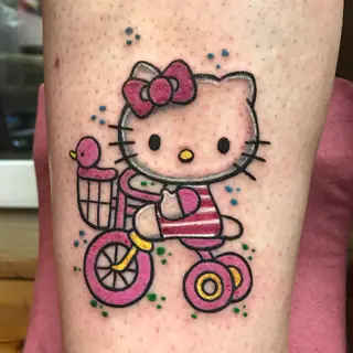 Tattoo von Tschiggy mit Hello Kitty im Bubblegum-Art-Stil