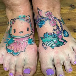 Tattoo von Tschiggy mit Hello Kitty im Bubblegum-Art-Stil