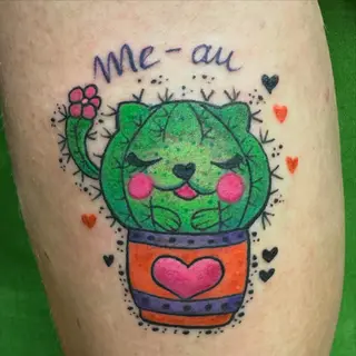 Tattoo-Entwurf von Tschiggy mit einer Katze und einem Kaktus im Bubblegum-Art-Stil