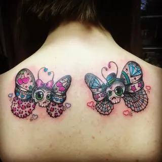 Tattoo von Tschiggy mit einem Schmetterling im Bubblegum-Art-Stil