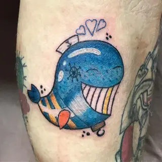 Tattoo von Tschiggy mit einem Wal im Bubblegum-Art-Stil