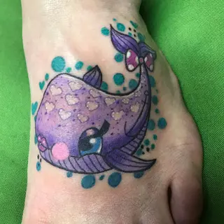 Tattoo von Tschiggy mit einem Wal im Bubblegum-Art-Stil